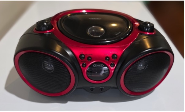 Black and red portable stereo with two large speakers and control buttons on top.