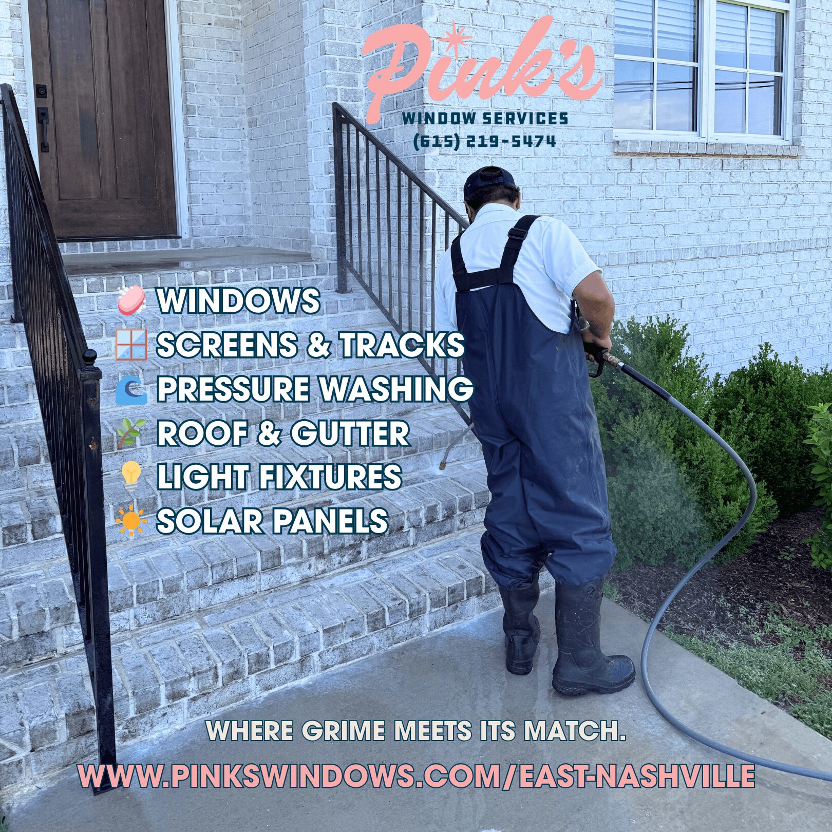 Worker in overalls cleaning stairs outside building with hose, window service company sign visible above.