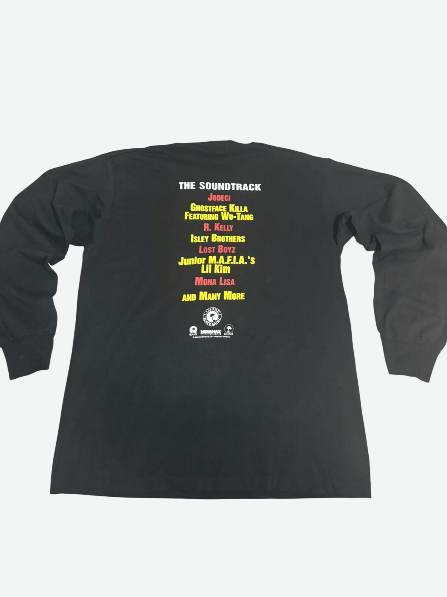 Black long-sleeve shirt with colorful text listing soundtrack titles and artists on the back.