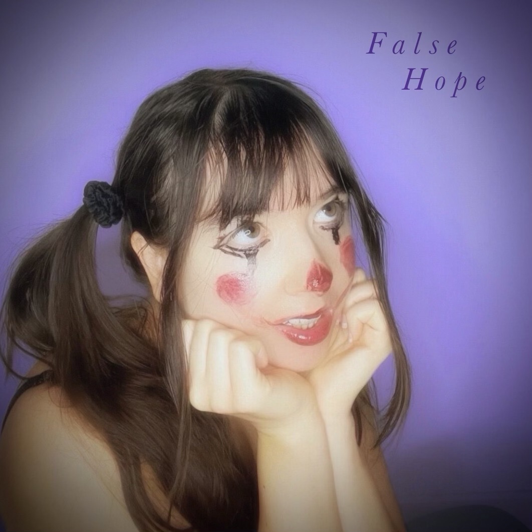 Young woman with clown makeup, resting her face on her hands, against a purple background with text.