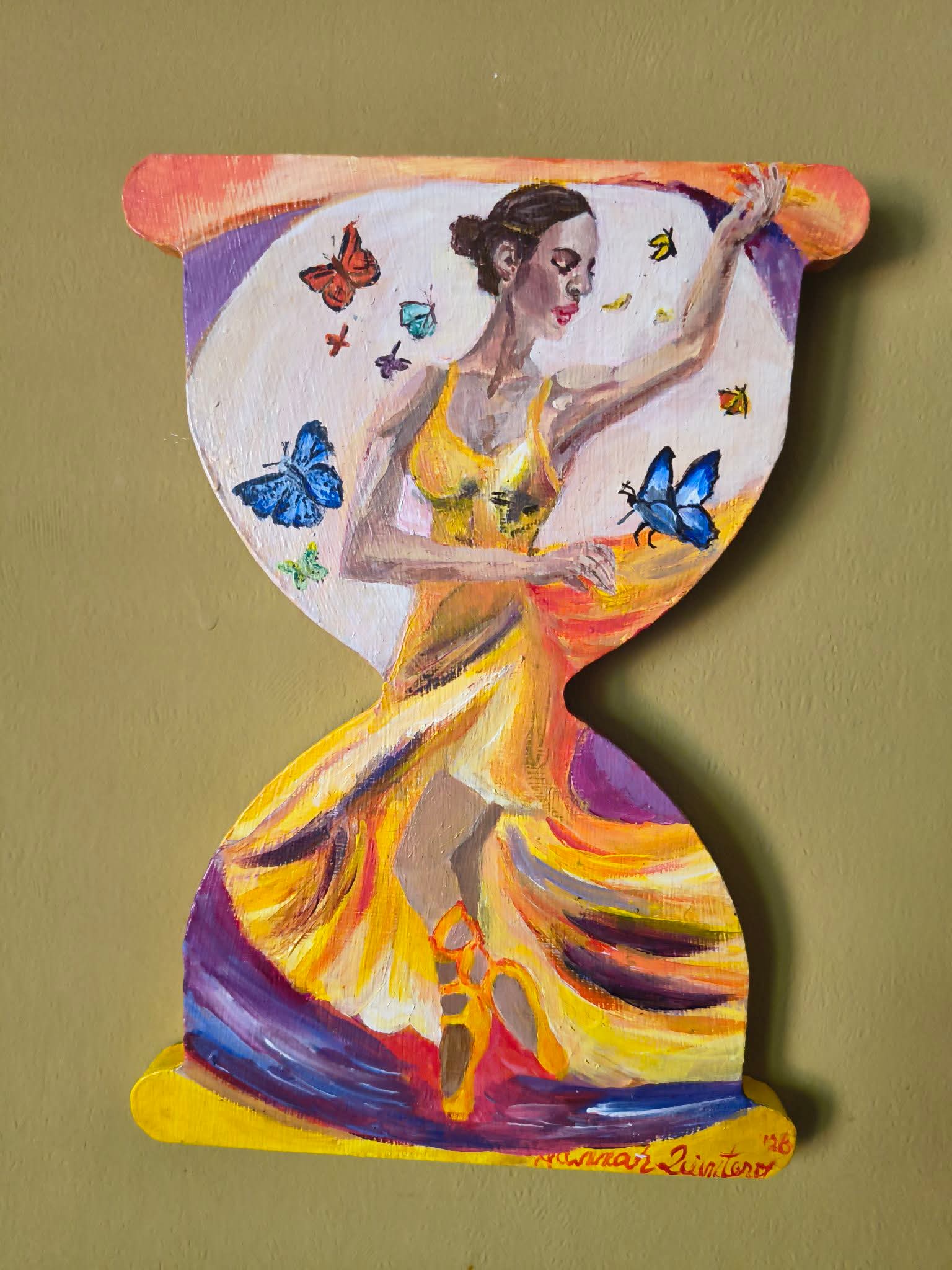 Painting of a woman dancing with butterflies, wearing a yellow dress, against a colorful background, on a decorative wooden plaque.
