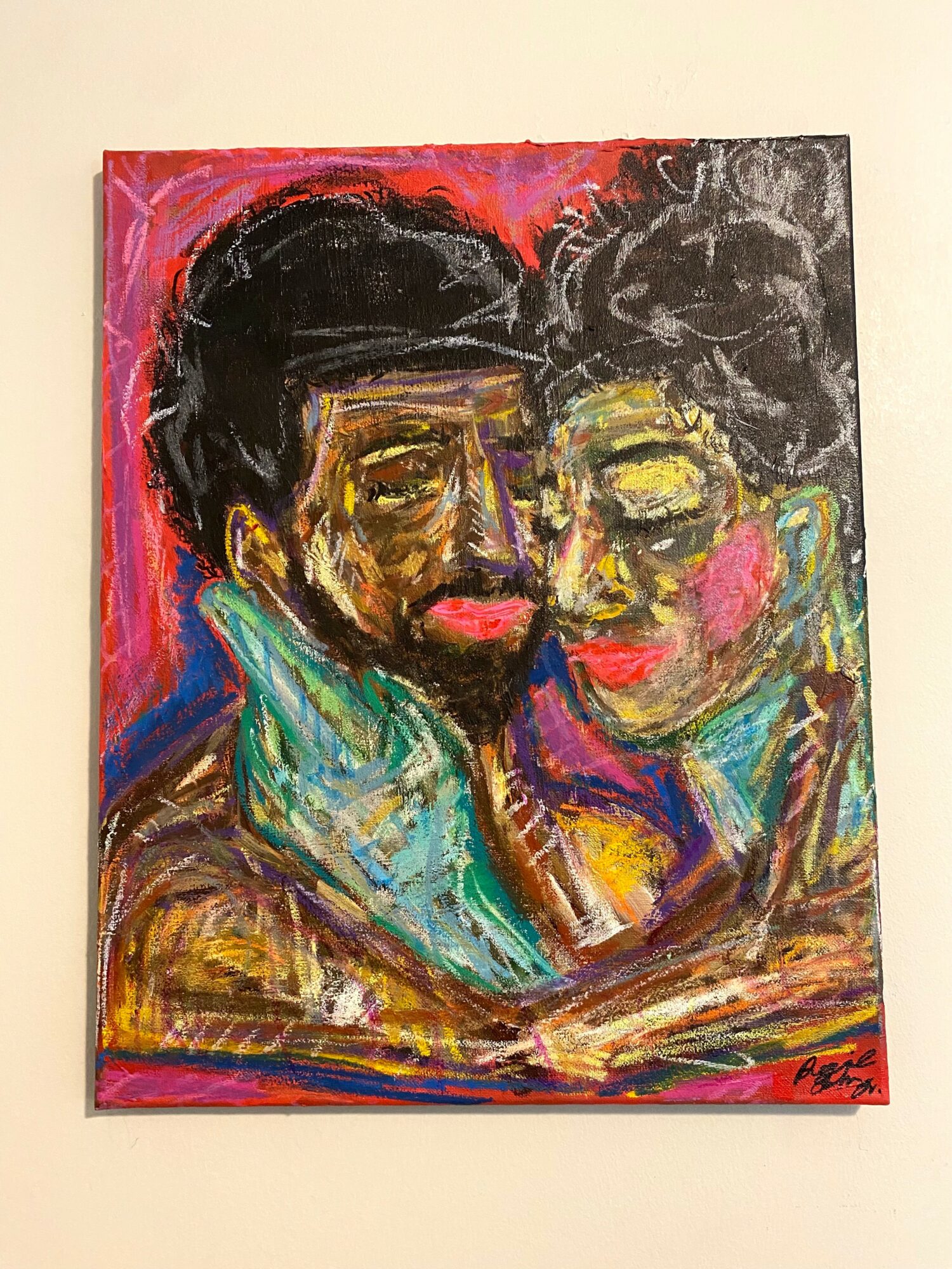 Two people with dark hair and glasses embrace, painted with vibrant colors and expressive brushstrokes.