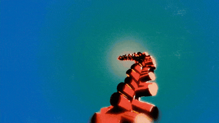 A red spiral staircase viewed from below against a blue sky background.