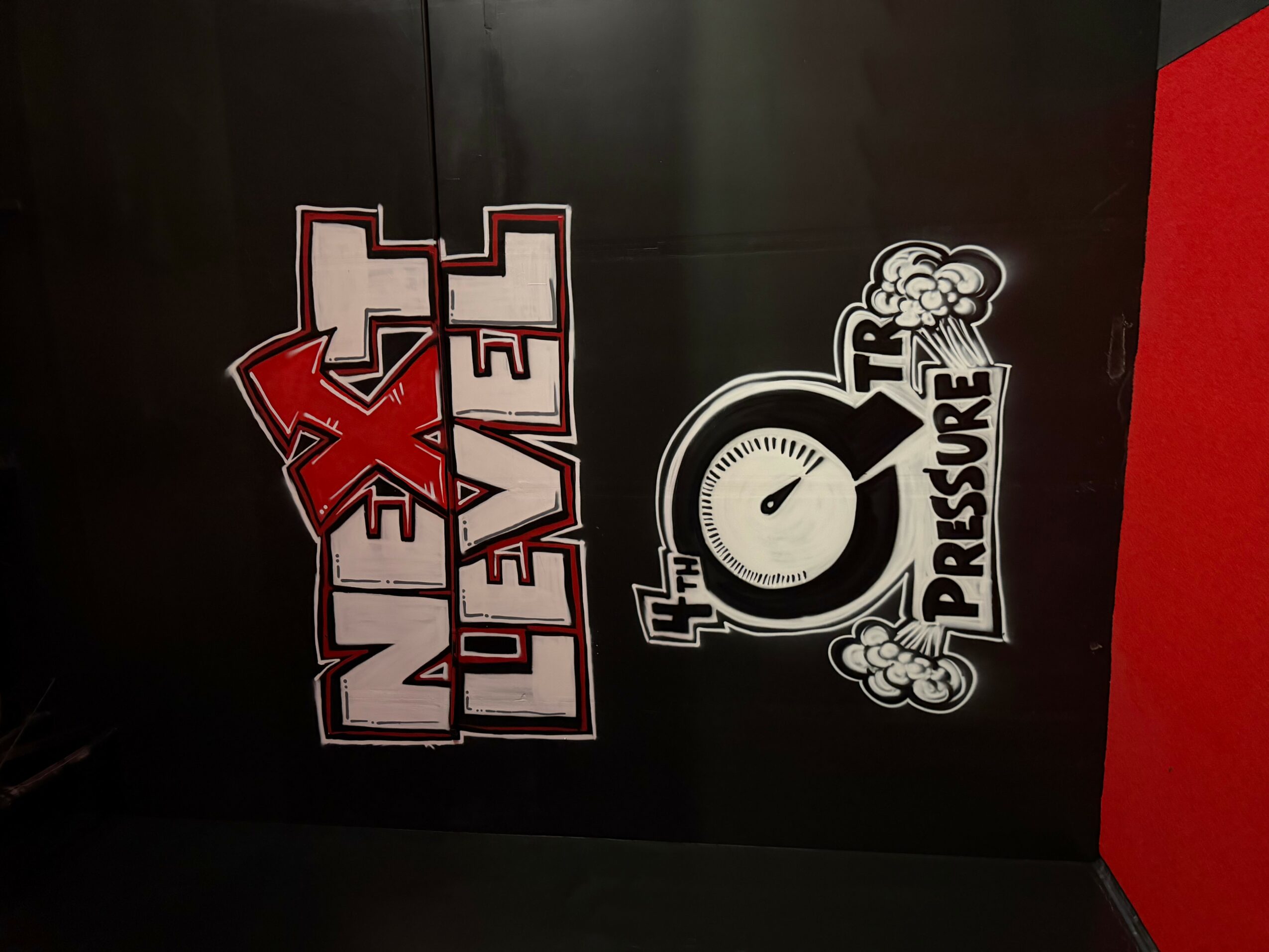 Two logos on a black background, one with text 'Next Level' and another with a gauge and steam, 'TRI PRESSURE'.
