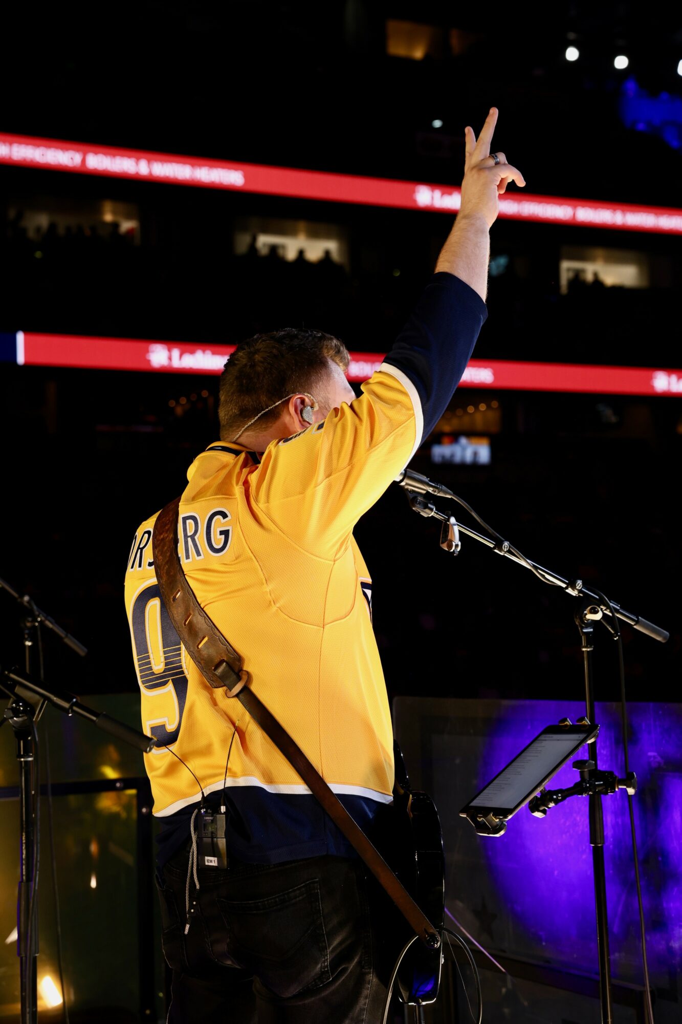 Person wearing a yellow jacket with