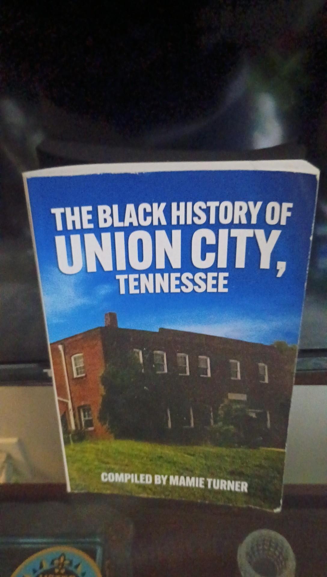 Book titled 'The Black History of Union City, Tennessee' with a building and trees on the cover.