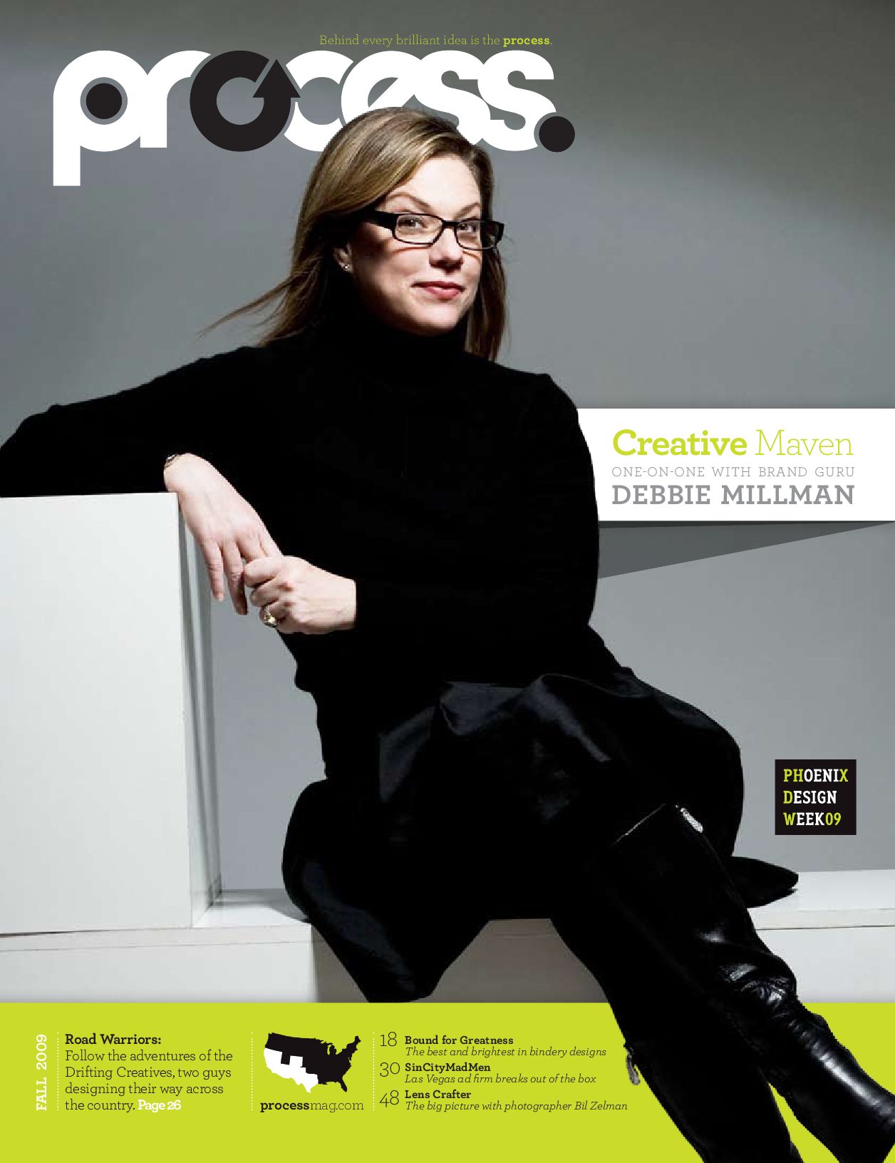 Woman with glasses and long hair sitting on a white chair, wearing a black outfit, against a gray background.