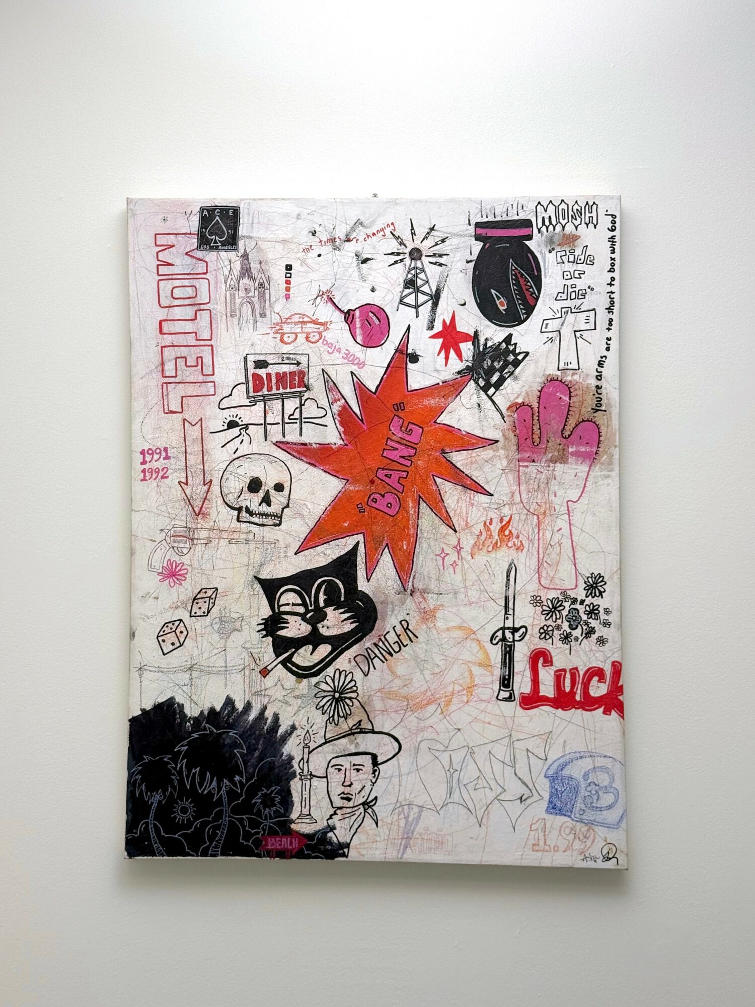 Wall covered with various graffiti, drawings, and stickers, including a skull, cat, and words like 'Luck' and 'DIME'.
