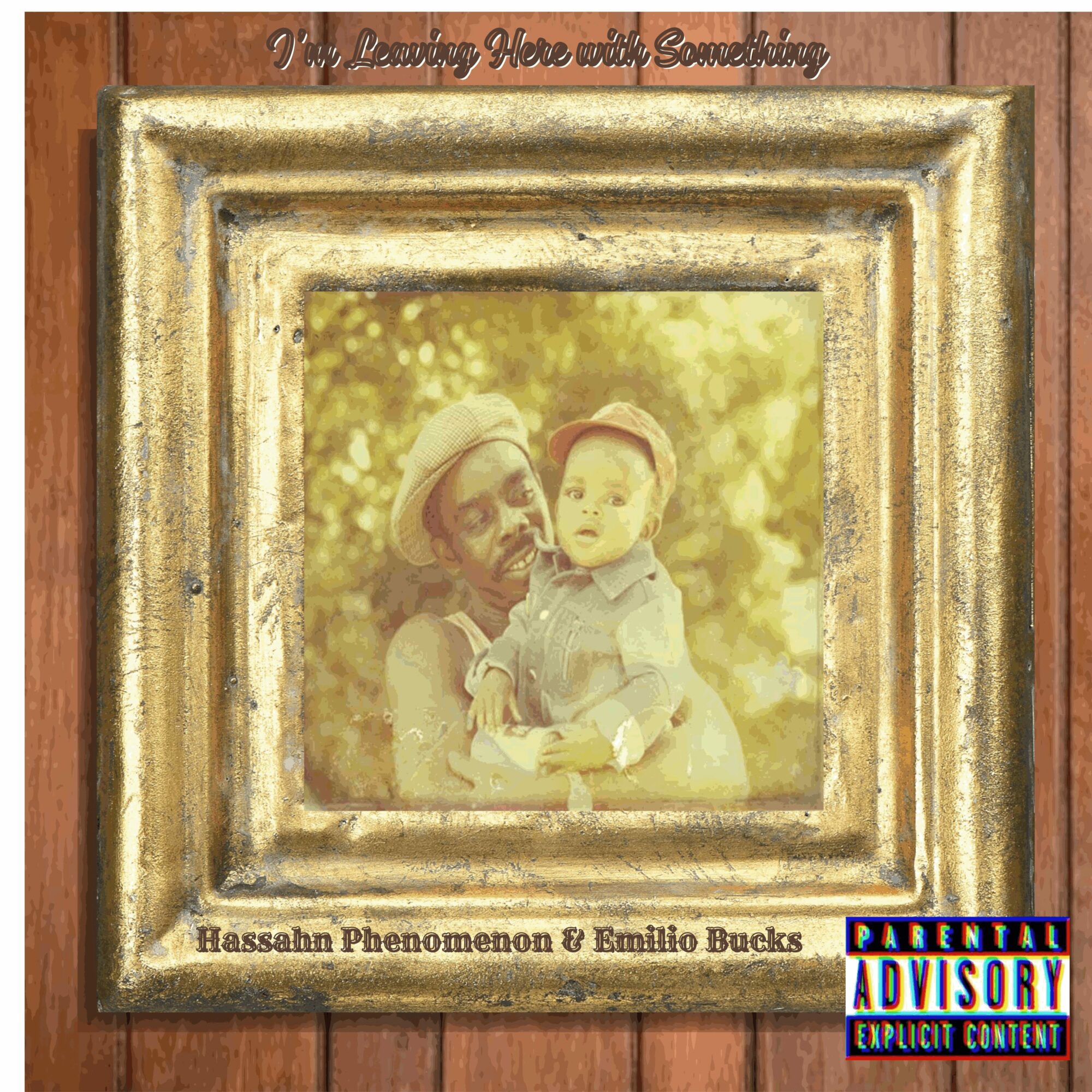 A framed photo of a person holding a child outdoors, with a wooden background and text at the top and bottom.