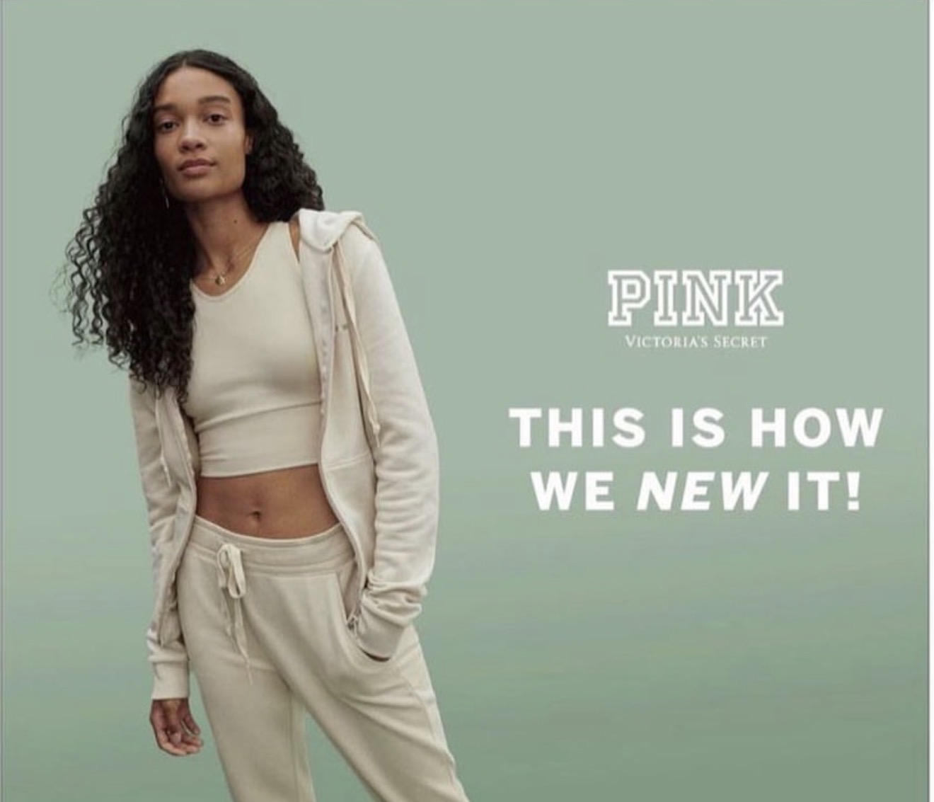 Young woman with curly hair wearing a beige hoodie and sweatpants, standing against a light green background with text.