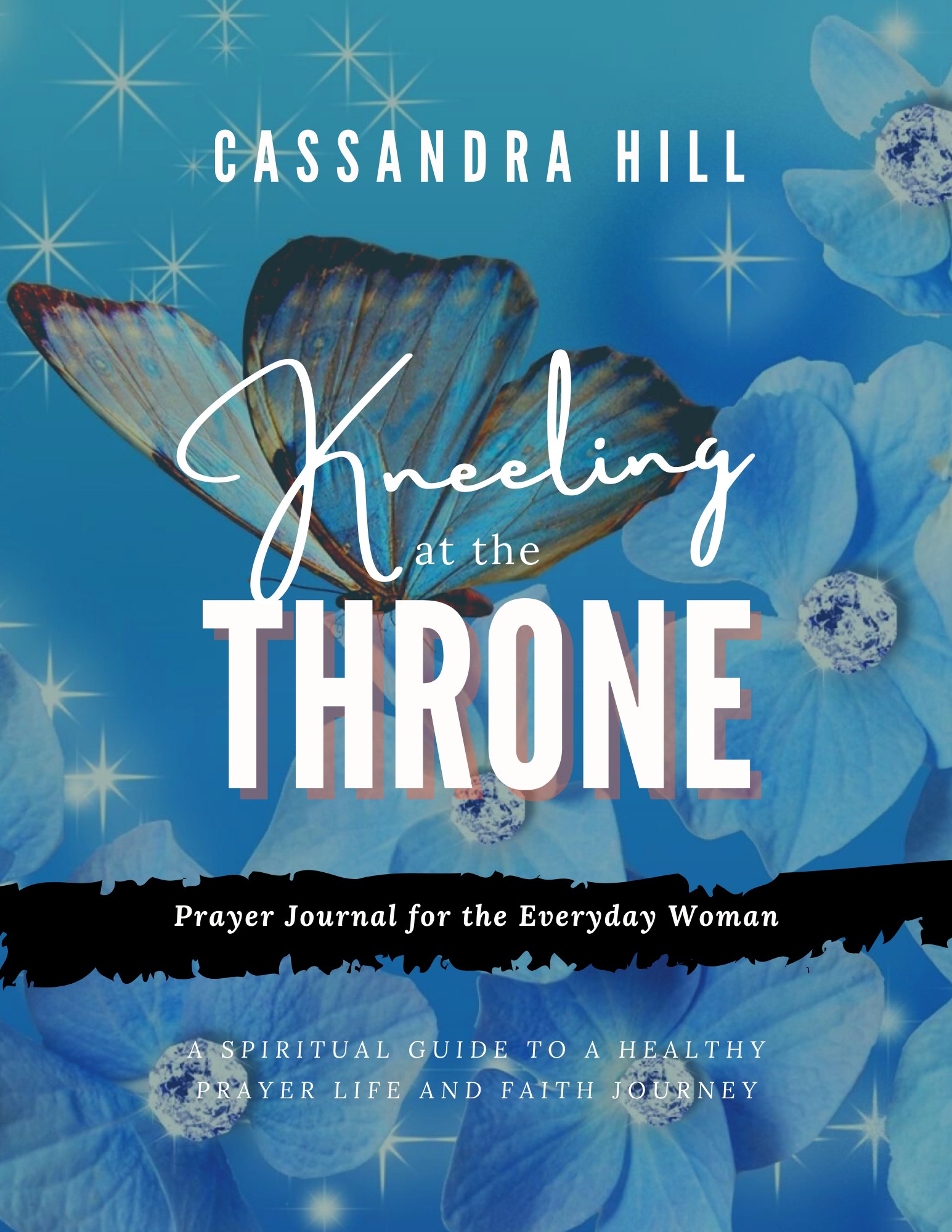 Book cover with blue background, flowers, and a butterfly, titled 'Kneeling at the Throne' by Cassandra Hill, subtitle about prayer journal.