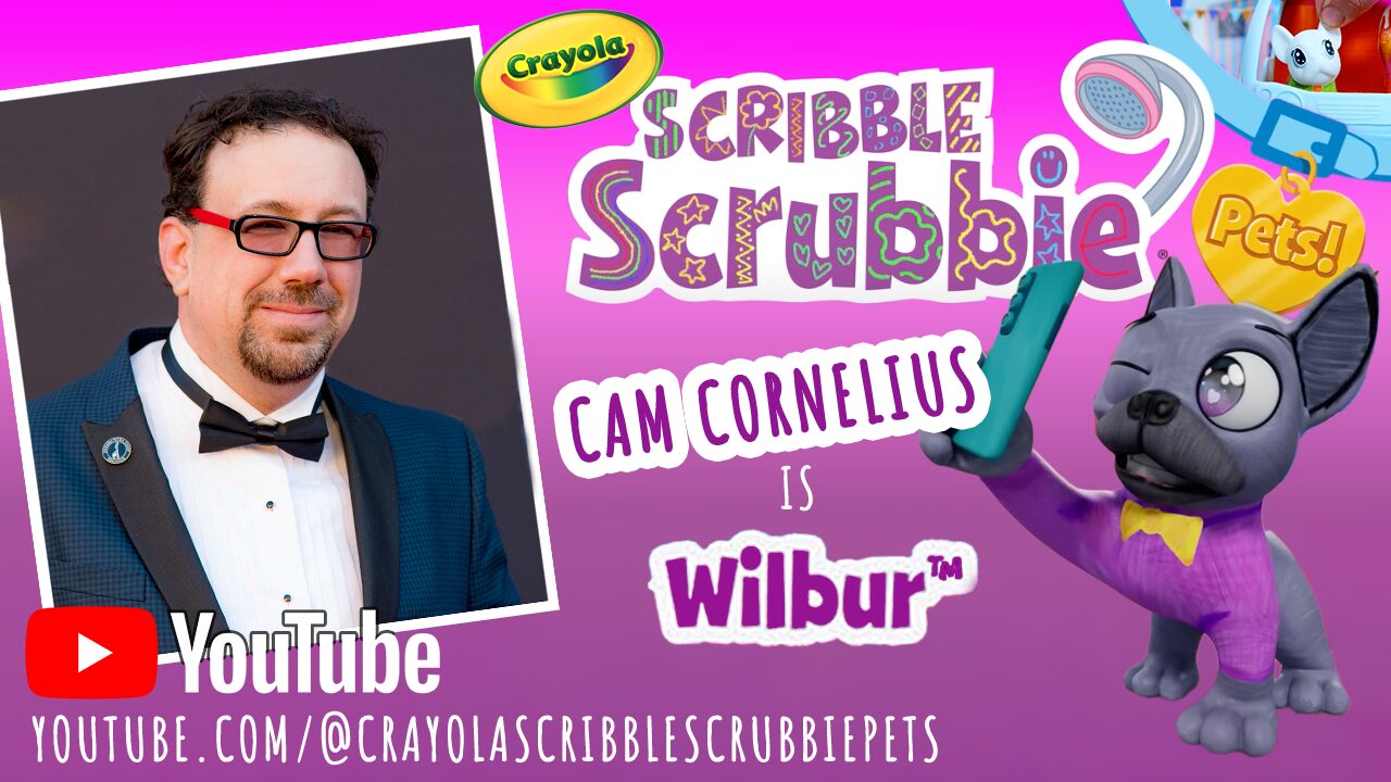 Promotional image for Crayola Scrible Scrubbie featuring Cam Cornelius and Wilbur, a cartoon cat, with colorful text and logo.