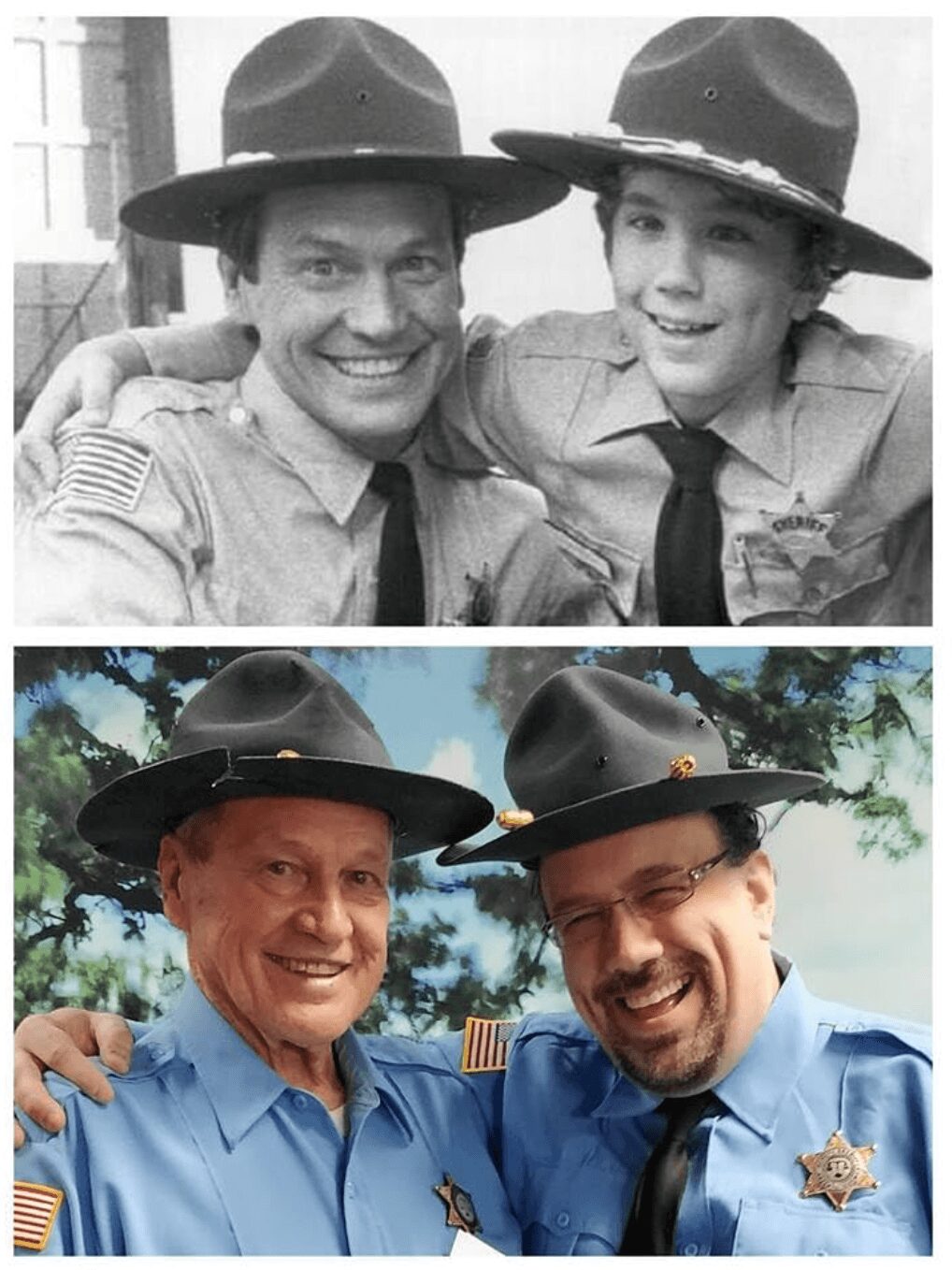 Two firefighters in uniform and hats smiling, with one having his arm around the other, outdoors with trees in background.