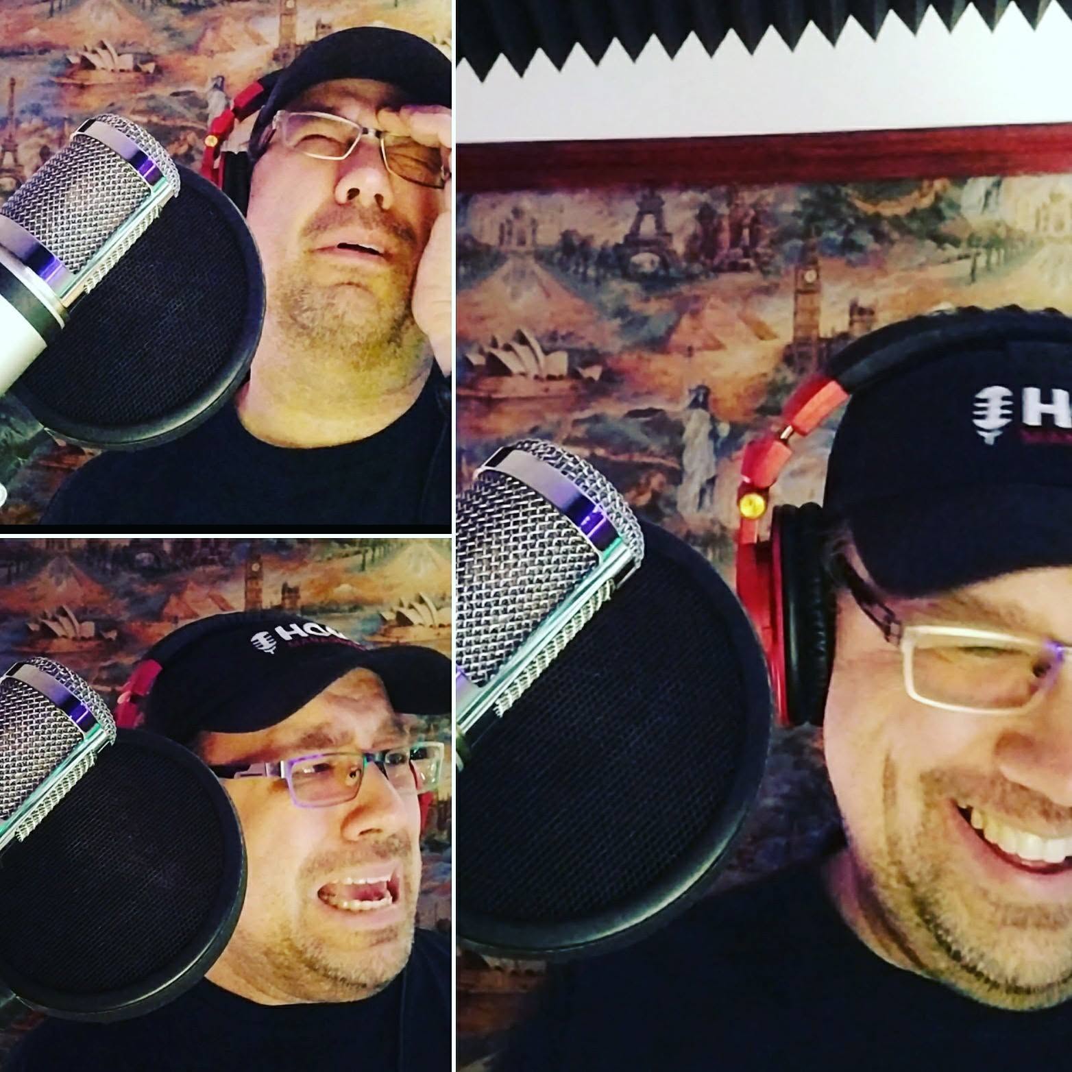 Person wearing glasses and a cap, smiling and speaking into a microphone, with a colorful background and a tapestry.