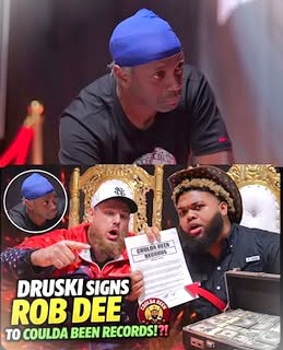 Three men, one wearing a blue head covering, in a room with gold decorations, one holding a document, with text about Rob Dee.