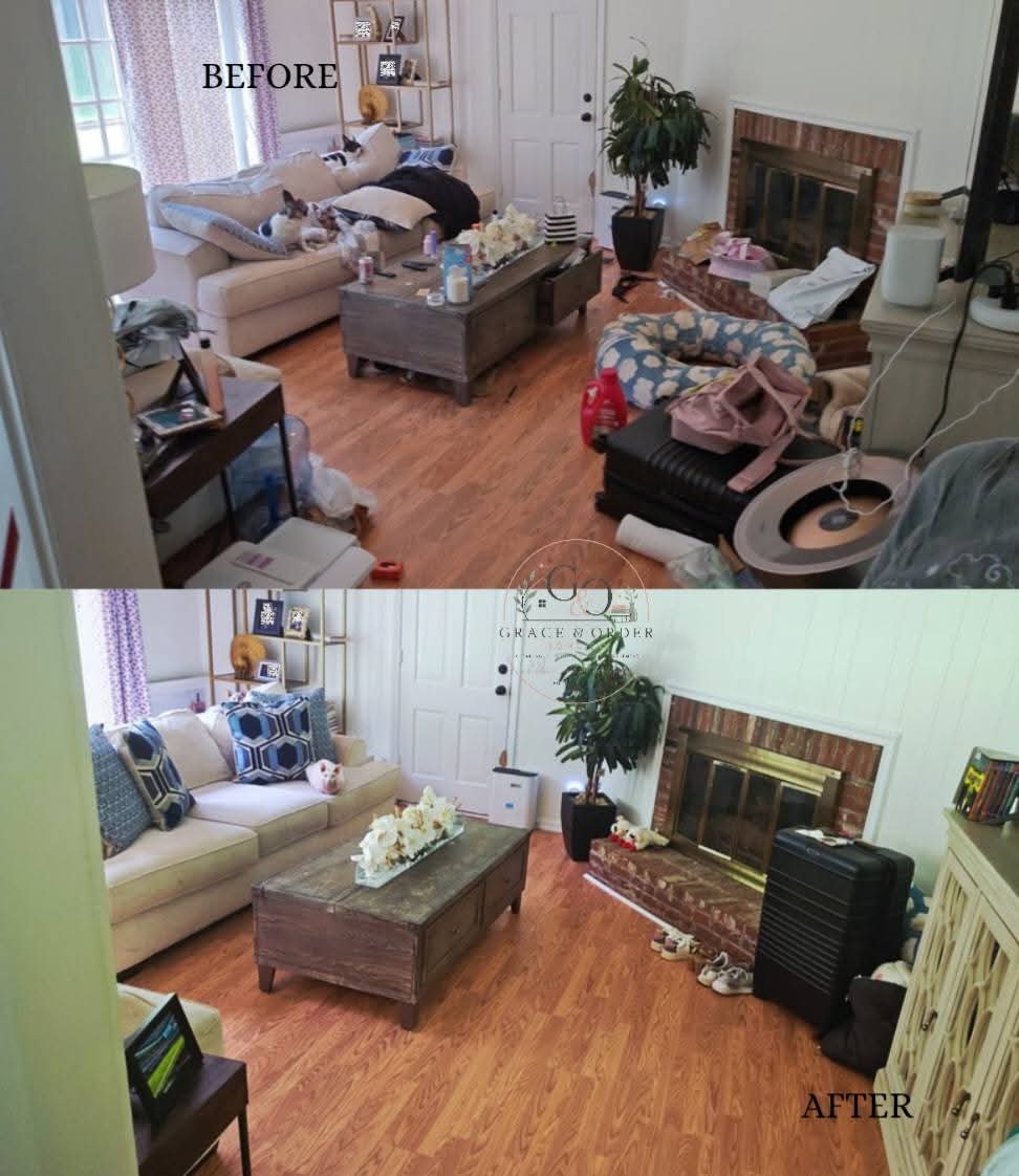 Living room with cleaned space, organized furniture, and a fireplace, after cleaning. Wooden floor, plants, and a coffee table visible.