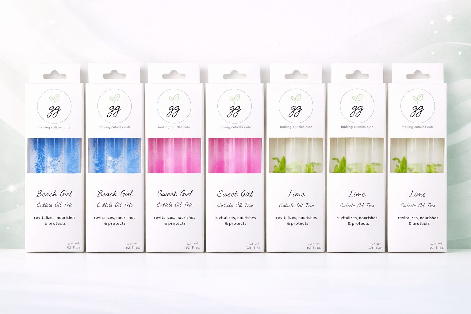 Six boxes of scented candles labeled 'Beach Girl' and 'Lime' with candles visible inside, arranged in a row.