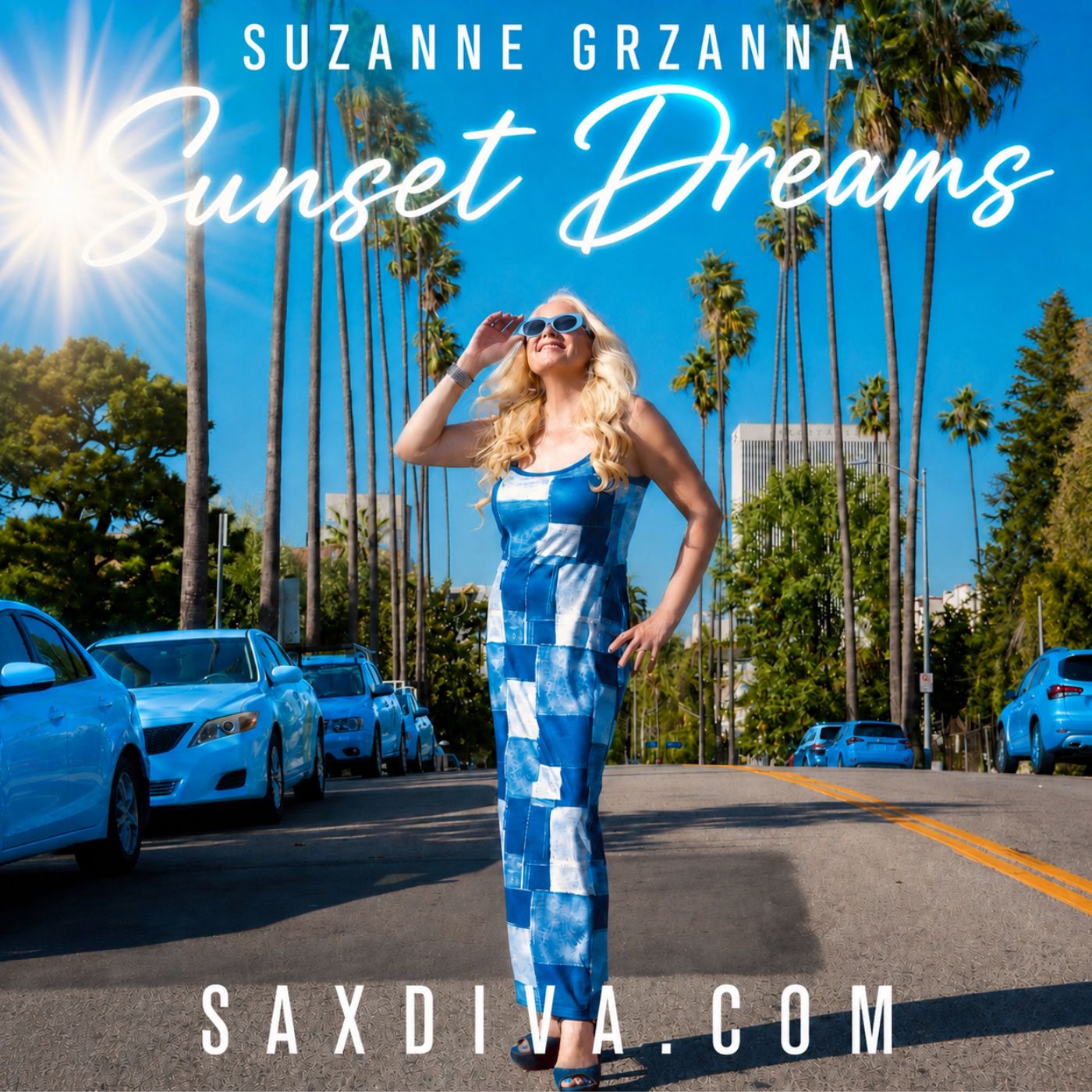 Woman in blue jumpsuit with sunglasses standing on a street lined with palm trees, cars parked on both sides, sunny sky.