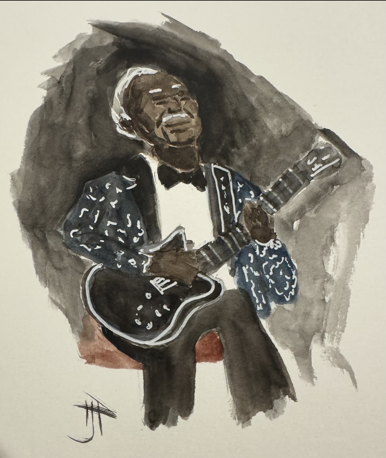 Person playing guitar, wearing a patterned jacket, seated, with a dark background, smiling, watercolor style.