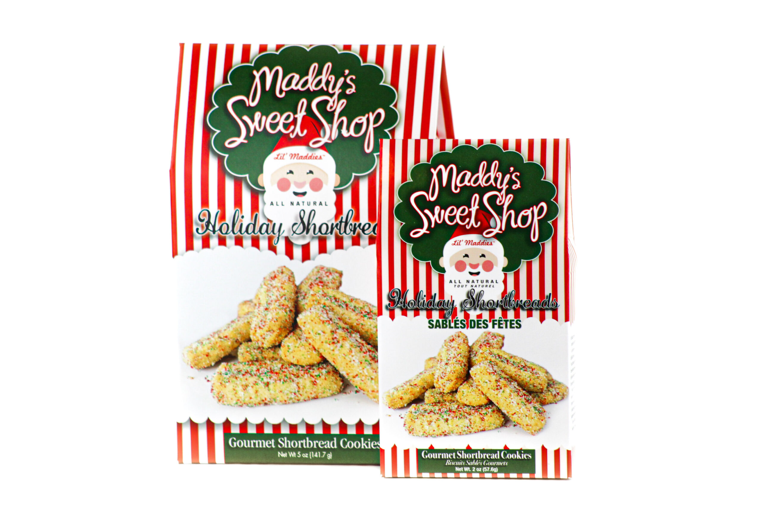 Package of Maddy's Sweet Shop holiday shortbread cookies with a festive label, cookies visible below, red and white striped background.