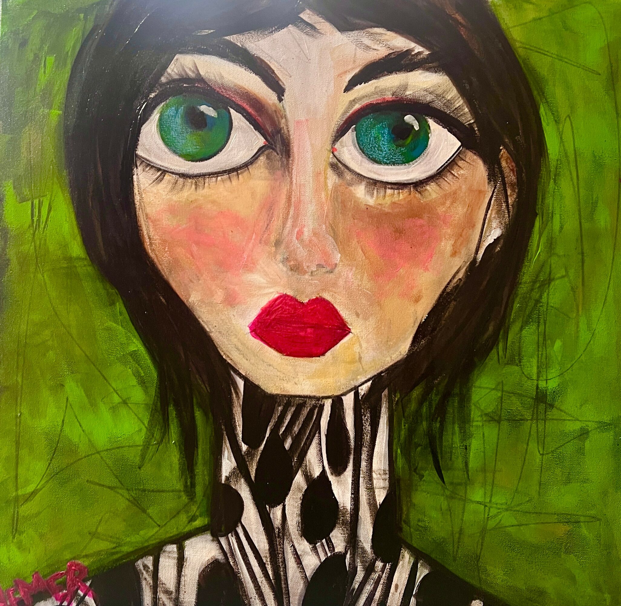 Portrait of a woman with large green eyes, dark hair, red lips, and a black and white striped shirt, against a green background.