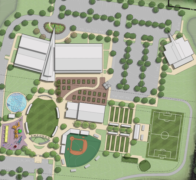 Map of a campus with sports fields, buildings, trees, and pathways, viewed from above.