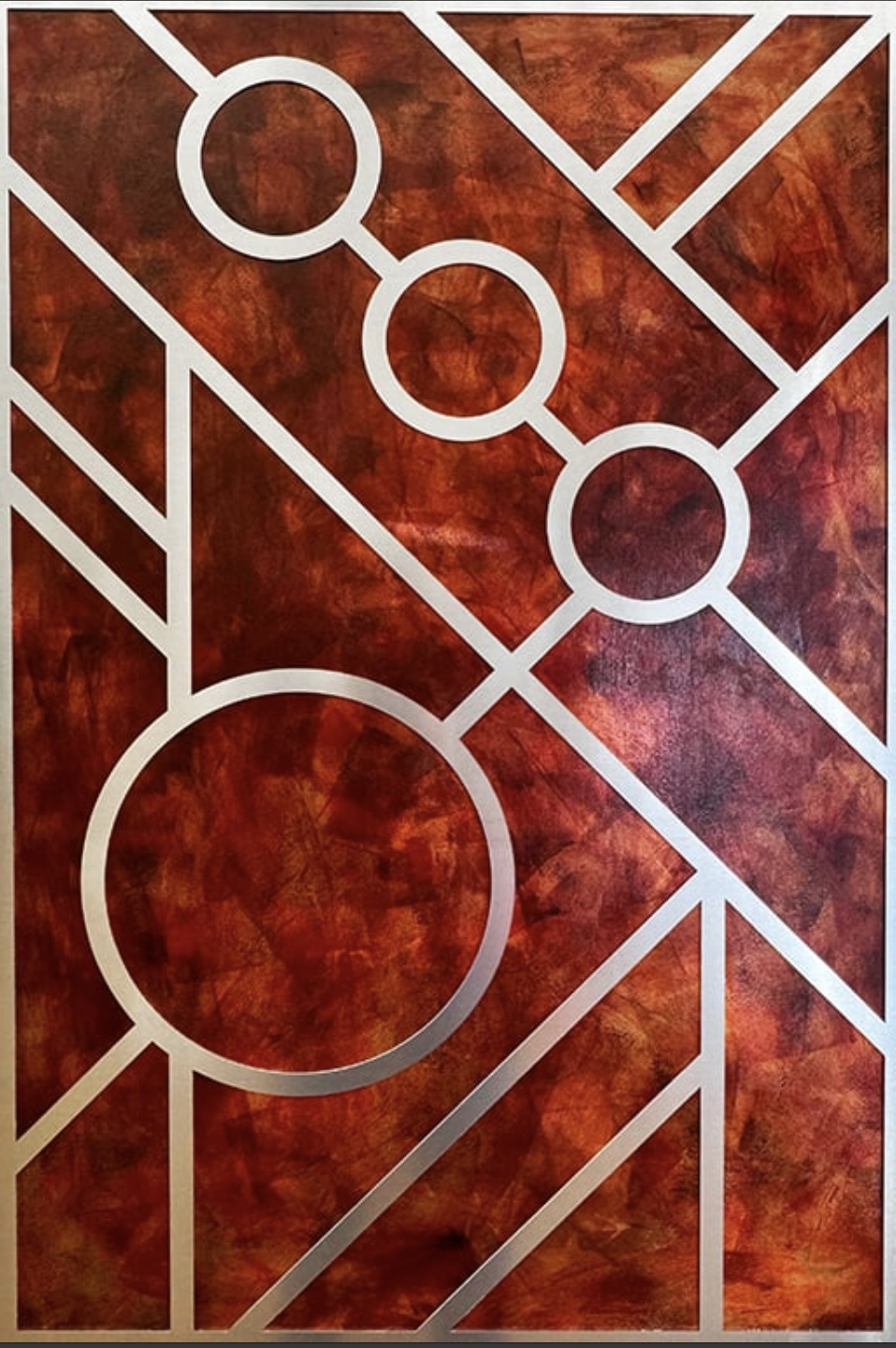 Abstract geometric design with white lines and circles on a reddish-brown textured background.