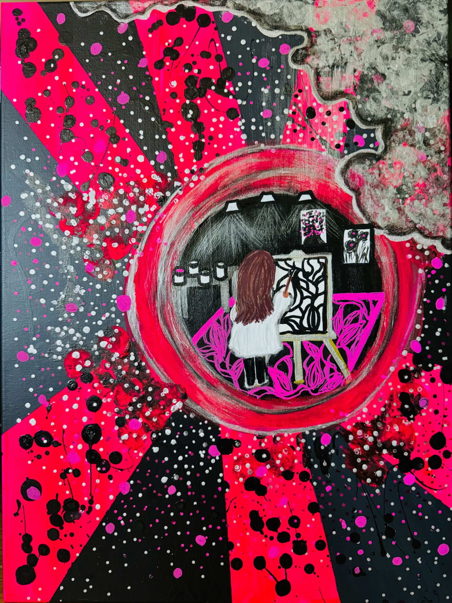 Person with long hair stands in front of a colorful, abstract background with splashes and patterns, facing a screen or display.