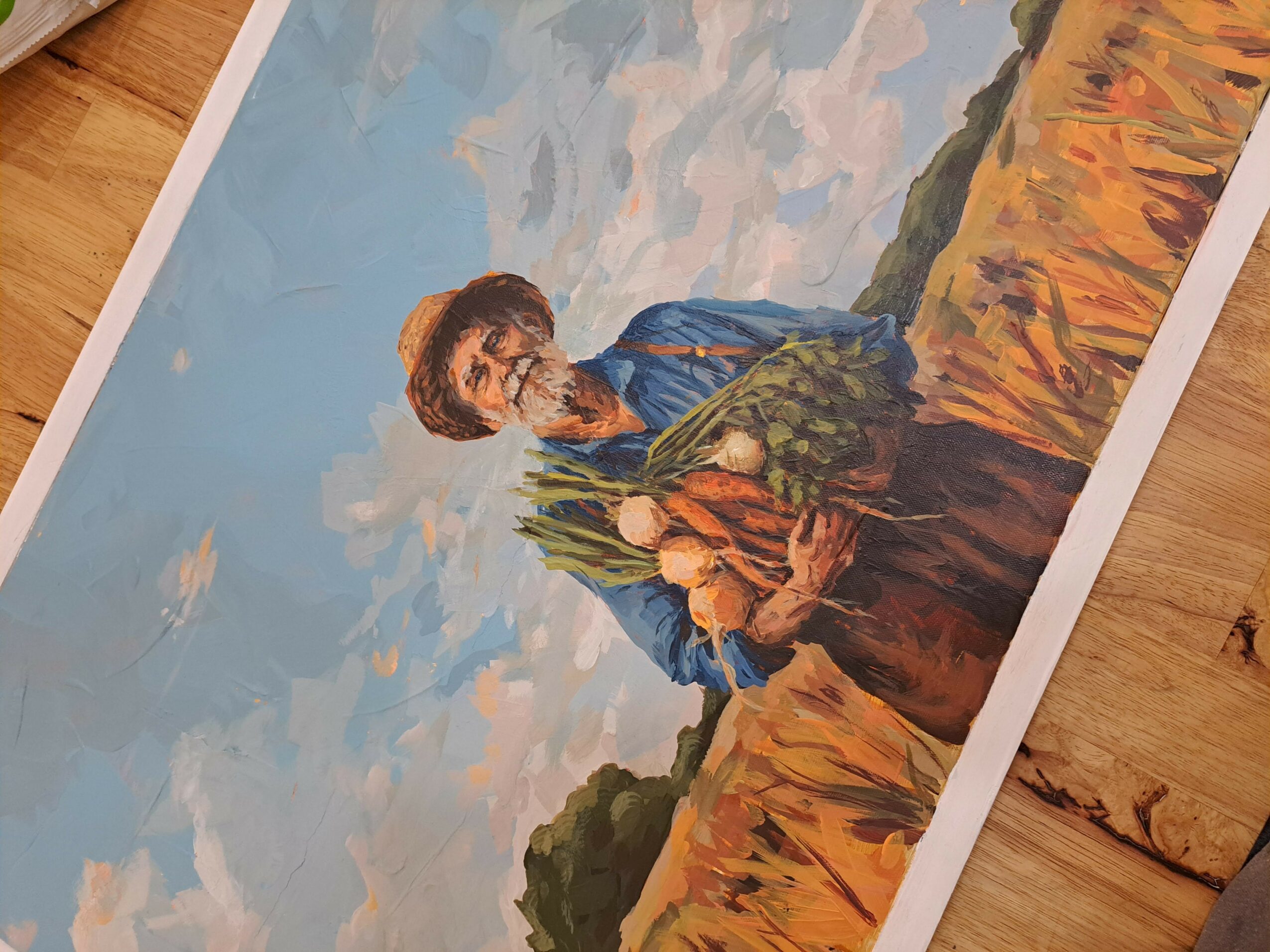 Person holding a basket of vegetables outdoors with a cloudy sky and landscape in the background.
